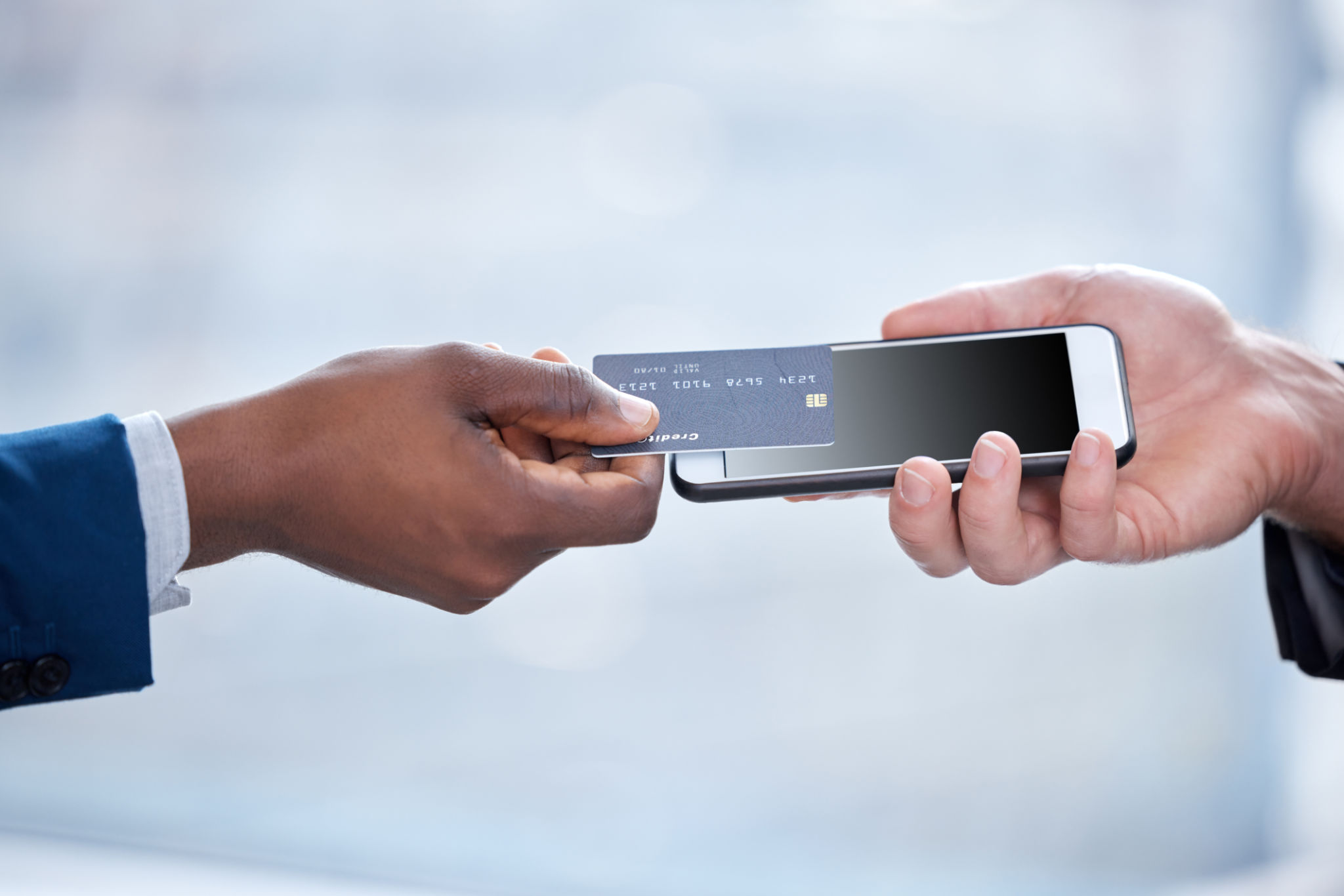 Contactless phone-to-phone payment at shop counter